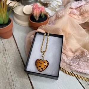 Gold Tone Long Twisted Chain Necklace With Leopard Murano Glass Heart